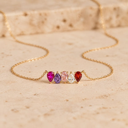 Collar Raíces con cinco piedras una al lado de la otra